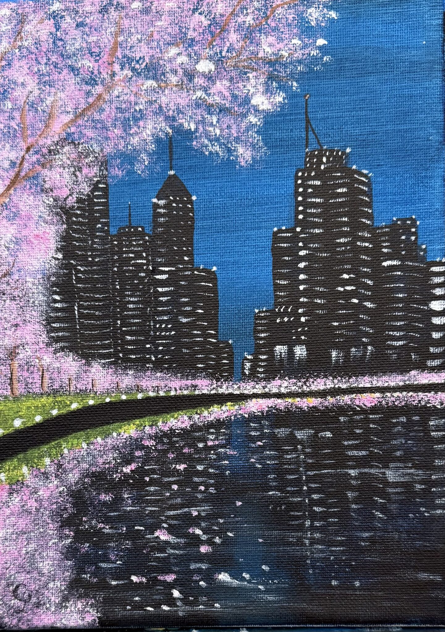 Cherry Lights paint and sip artwork with city skyline, water reflections and pink cherry blossoms at night