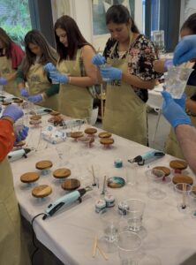 Beginner resin art workshop with participants creating resin coasters at Colourful Wine Tallawong